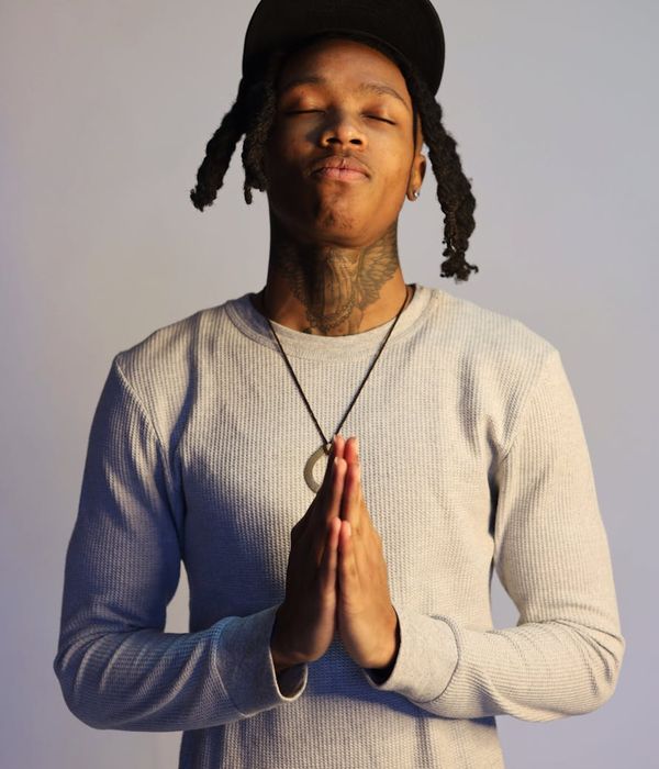 Person in a meditative pose, finding calm and focus through practice.